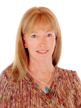 Lynn Conway, photographed in 2006, smiling towards the camera.